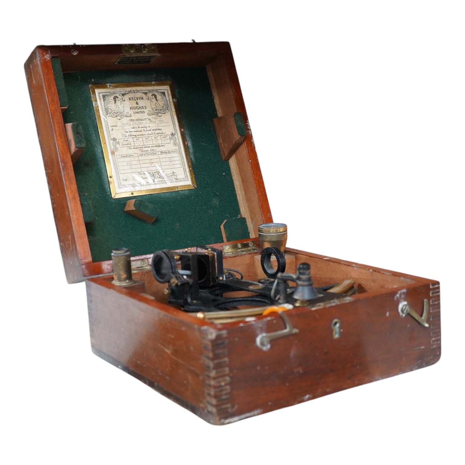 An early 20th century H. Hughes & Son Ltd. London, ‘Husun’ mahogany cased sextant, with engraved maker to the scale, also engrave serial number 29221, and with a battery pack for illuminating the scale, plaque to the ins